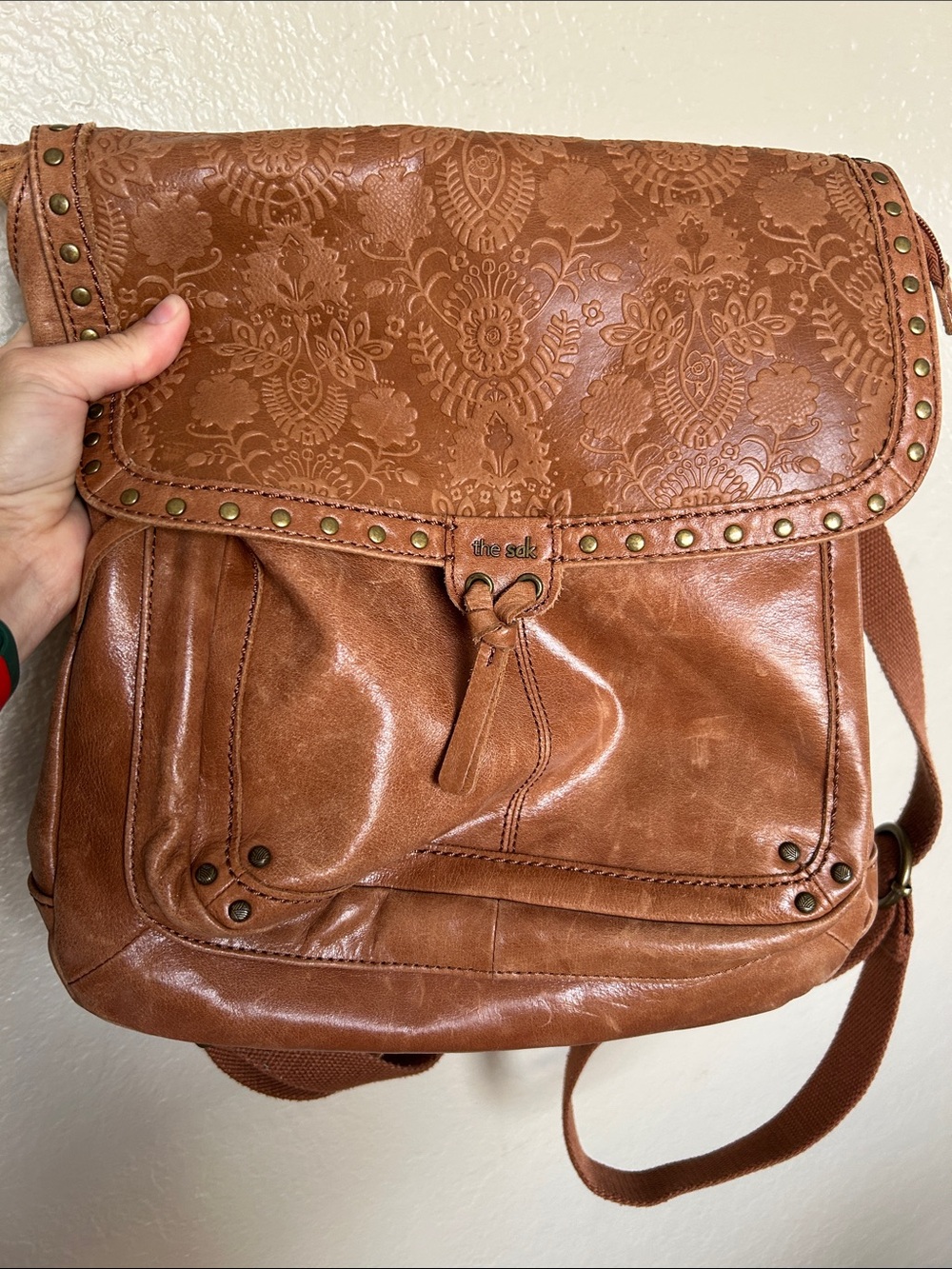 The Sak Embossed Leather Backpack in Cognac Brown